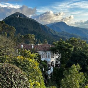 The Andes above Bogotá, Colombia, with Monserrate on the peak and an old house tucked into the trees.